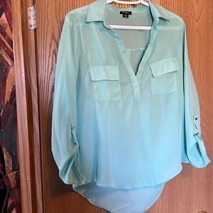 Light blue blouse with pocket and arm details